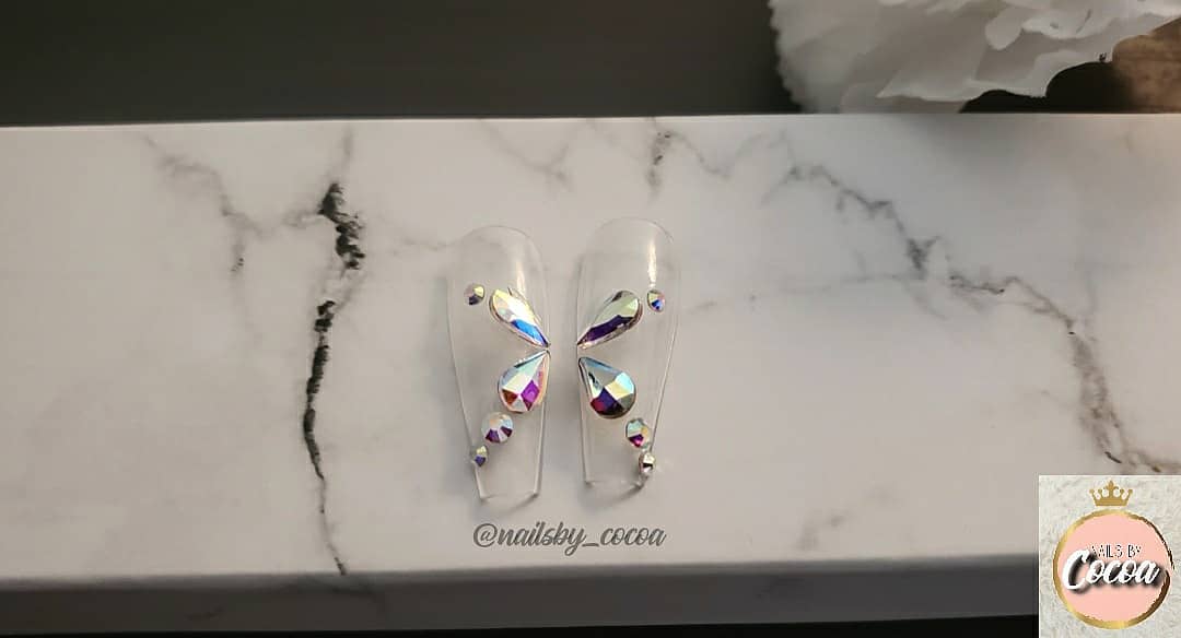 All we can say is... WOW
'Crystal Mariposa' is something we'll be dreaming about! Featuring clear nails with rhinestones galore.
Visit the link in bio to purchase!

#pressons #pressonnails #nails  #crystals #rhinestones #rhinestonenails #nailart #butterfly #diamonds  #blackowned