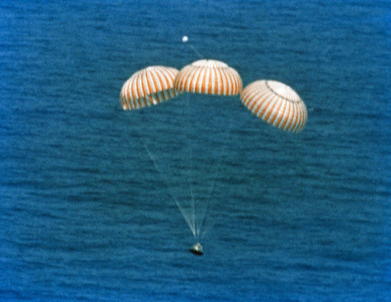 The more things change, the more they stay the same. SpaceX splashdown and the Apollo Splashdown 1975. Red striped parachutes = the deceleration of choice.