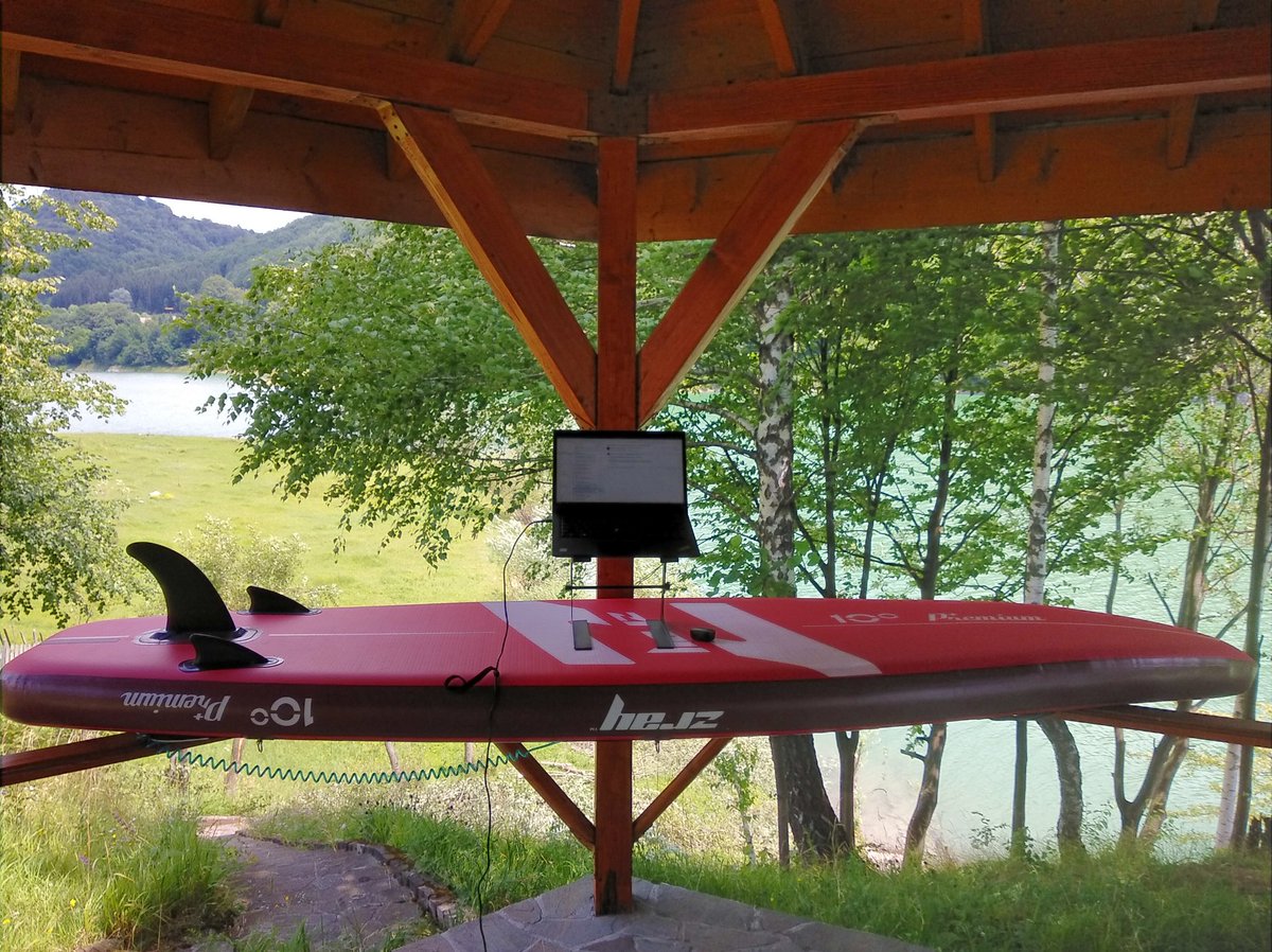 buiestru's tweet photo. Does this temporary covid-19 #wfh setup deserve to be promoted to full-time? It certainly has something going on with its name: stand up paddle board as standing desk base 🤨 https://t.co/GPHbfqJjPI