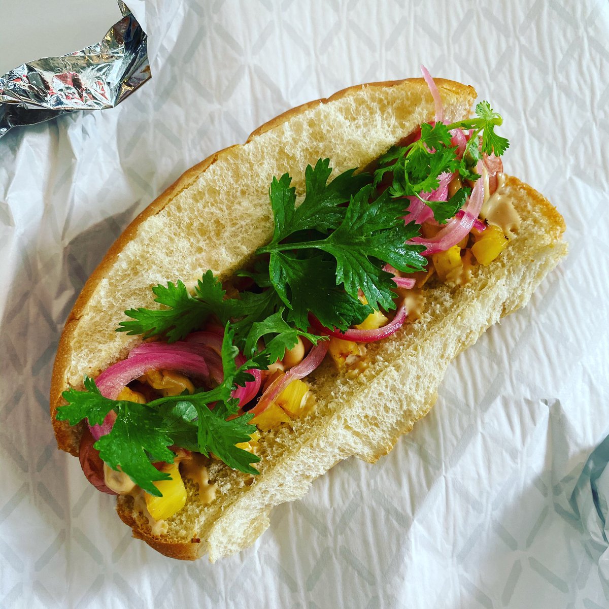 Here’s one of the many hot dogs we‘be got on our special holiday Monday menu. Open 11-7pm for these tasty treats plus a great beer lineup from our <a href="/SidewalkBeer/">SidewalkBeerShop</a> shop!