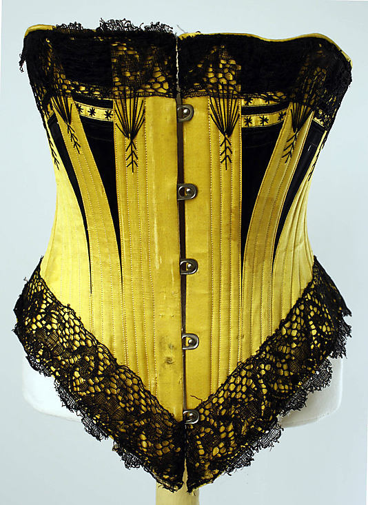Over this would come a corset. It fitted from the waist to under the breasts; it could be tightly laced to ensure a tiny waist, and it also had the effect of pushing the breasts together and up to create an ample cleavage.