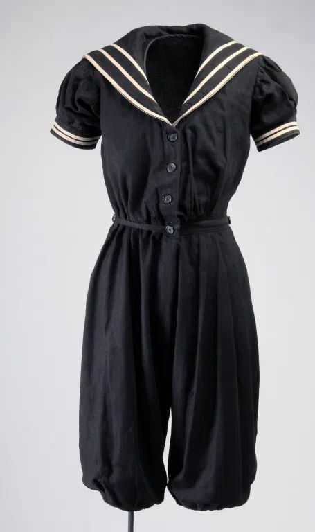 Trousers may be ankle-length or just below the knee, worn with dark stockings or socks for modesty’s sake. In keeping with the nautical theme, popular colors include navy, black, and gray, with trims of red and white