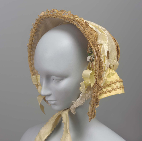 Gloves and a bonnet—never a hat—are worn with a visiting dress.