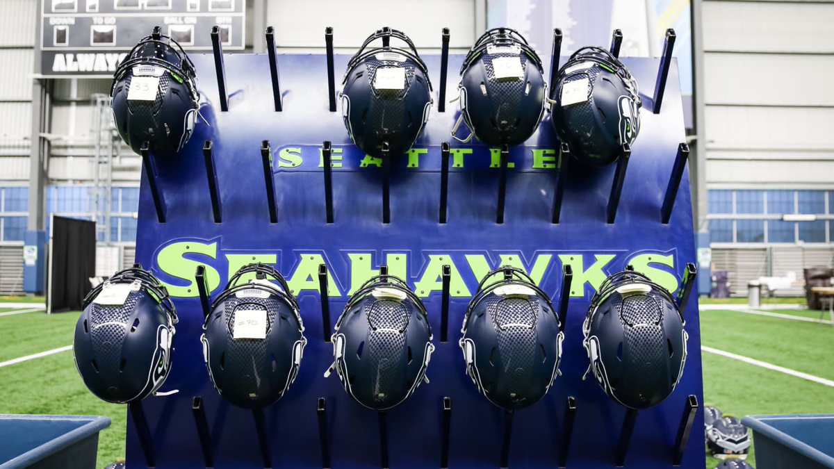 EquipmentGeek's tweet photo. Wall of Seahawks helmets. Looks like the SpeedFlex will be the standard again this season! https://t.co/YEv7DaAdQM