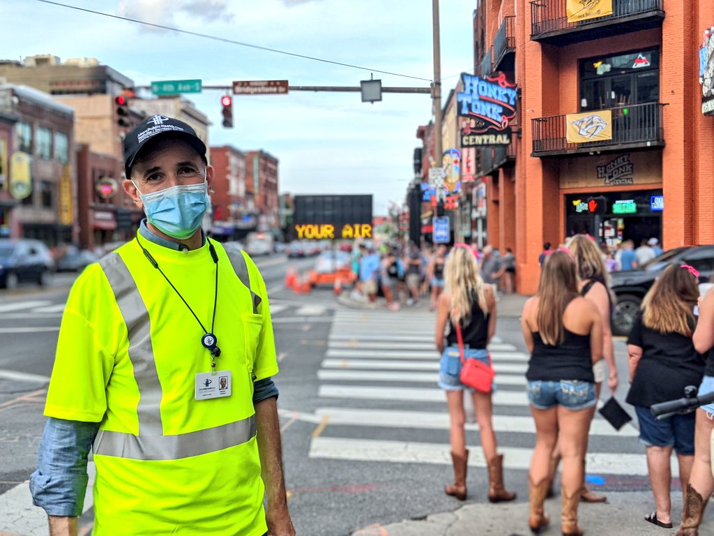 Despite warnings, majority of people are taking their masks off once officials move on. Or declining free masks or saying they have one...put away. Definitely more masks than what I saw on July 4th weekend, but they're strapped on foreheads, around necks or shoved in pockets.