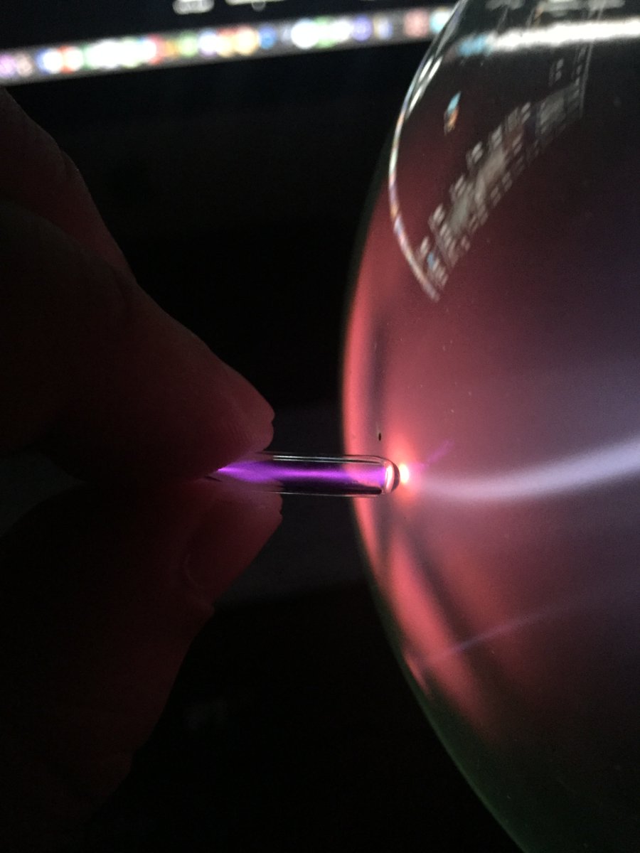 Argon  #elementphotos. In the small low-pressure ampoule the discharge is quite a striking shade of purple, while in the larger ampoule it is a more diffuse pale blue, though purple at the point of contact with the ampoule tester.