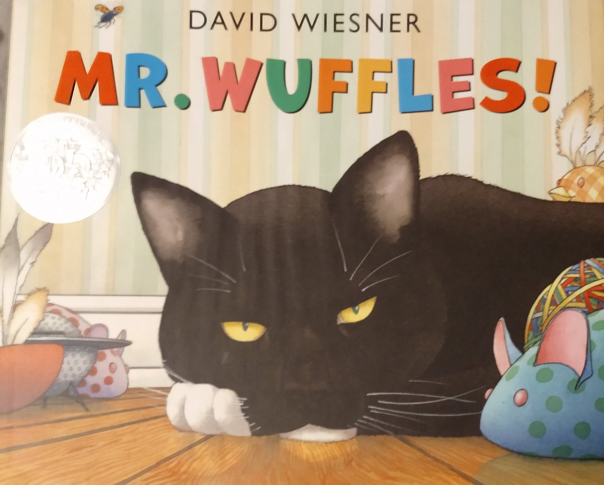 58. Mr Wuffles!Like the last book, recommended by a mutual.No words; I understand the game is to ask your child to tell /you/ a story based on the pictures.What do you imagine is happening?