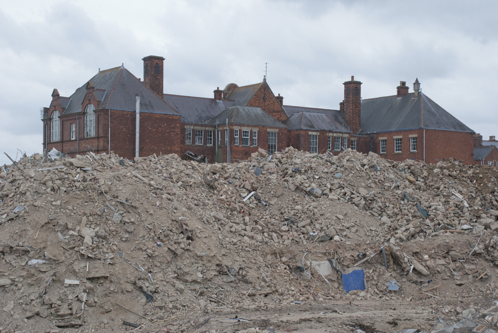 jratcliffephoto's tweet photo. Monday's #ThisIsSwindon. The #Swindon Technical College sitting in a landscape of rubble at Regent Circus, from 2012. https://t.co/eS15p1d6CW