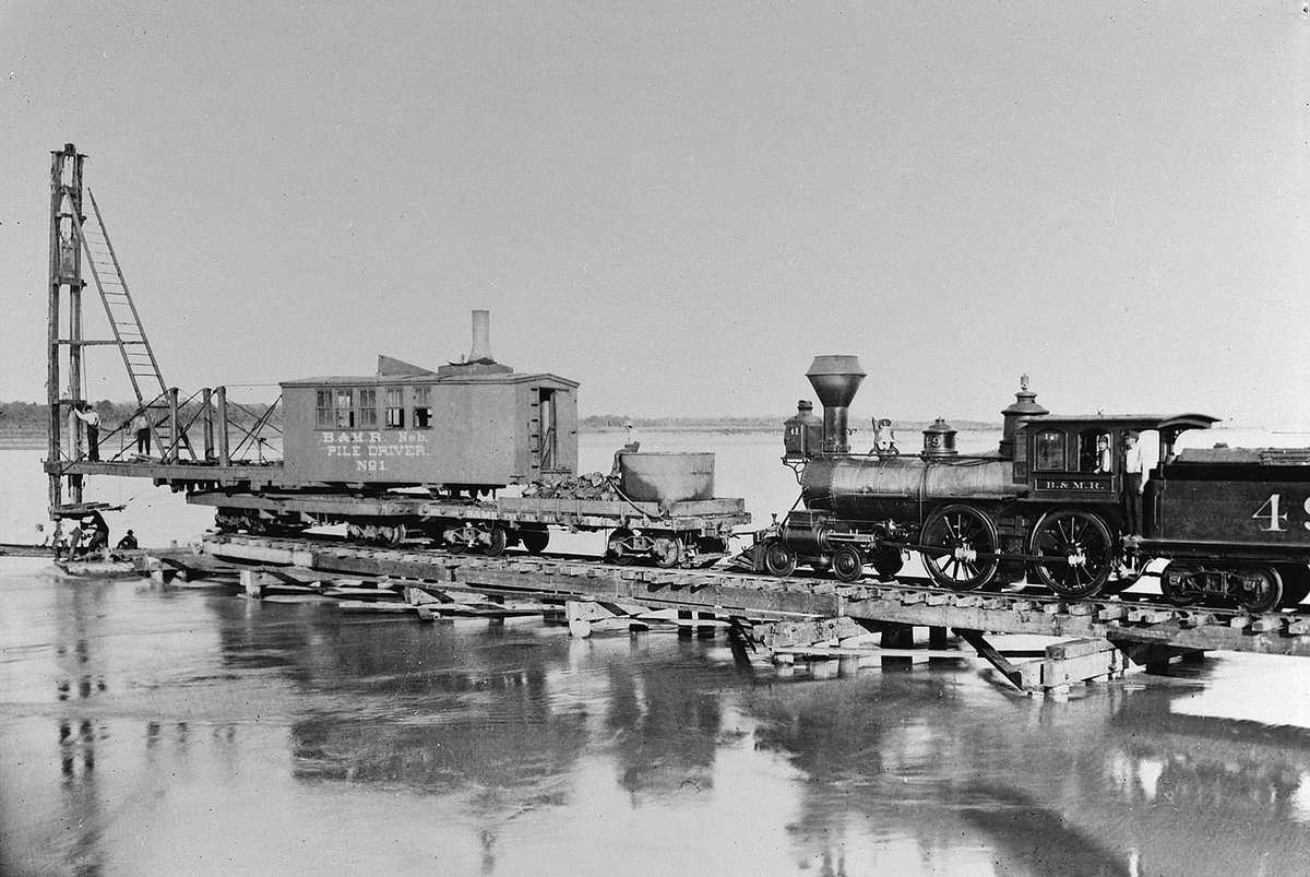 PucudaNetting's tweet photo. Driving piles for a railway bridge.

Photo courtesy of The Library of Congress.

#ConstructionWorker #ConstructionSafety #ConstructionWorkers #railroads #railroad #construction #constructionmachinery #constructionequipment #constructionsite #constructionlife https://t.co/20CLwopMFG