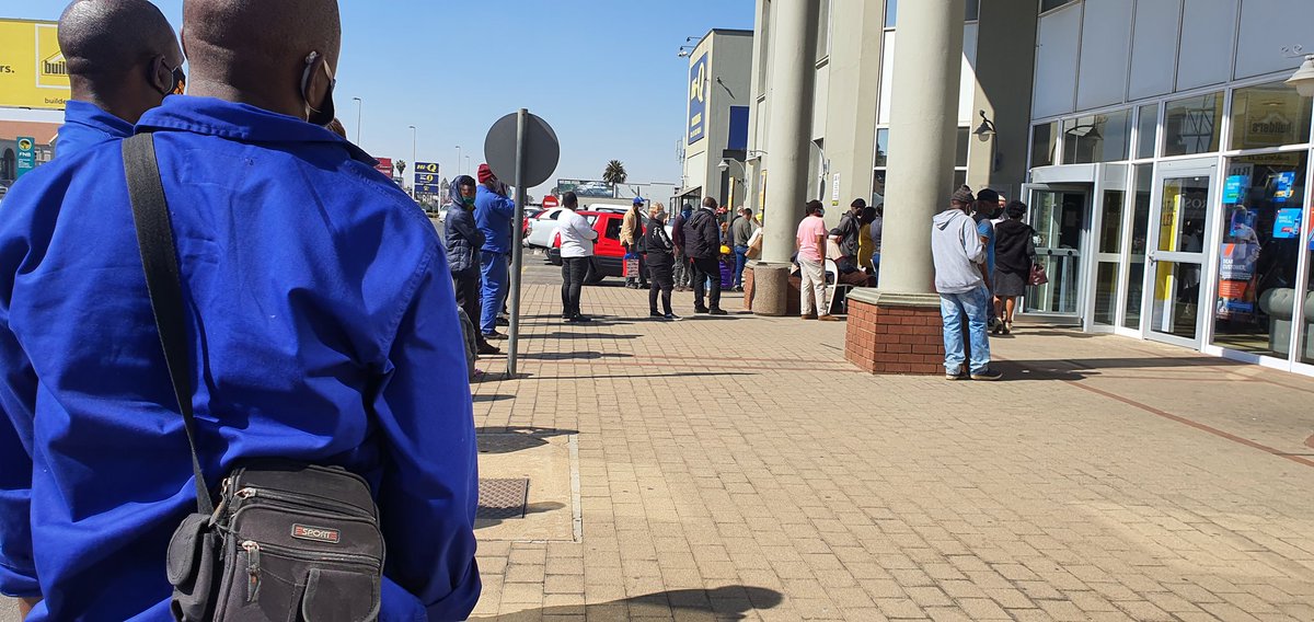 Teerona's tweet photo. Standing 2 hours in the hot sun and this @StandardBankZA queue is not moving. After closing so many branches they don't have the capacity to help their customers. https://t.co/iOUBfUw3pw