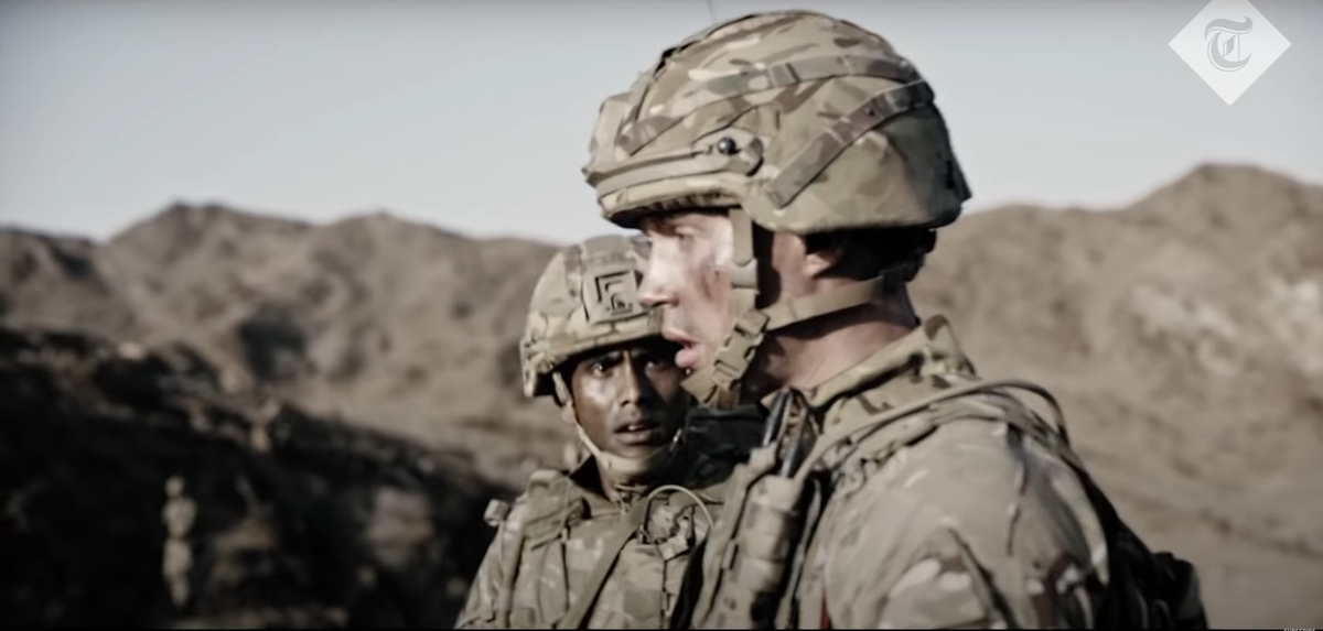 One of his mates in the army looks at him. He's totally lost the plot at this point, as his friend just stares at him with a state of anxiety thinking "What the hell is going on in this man's mind?"