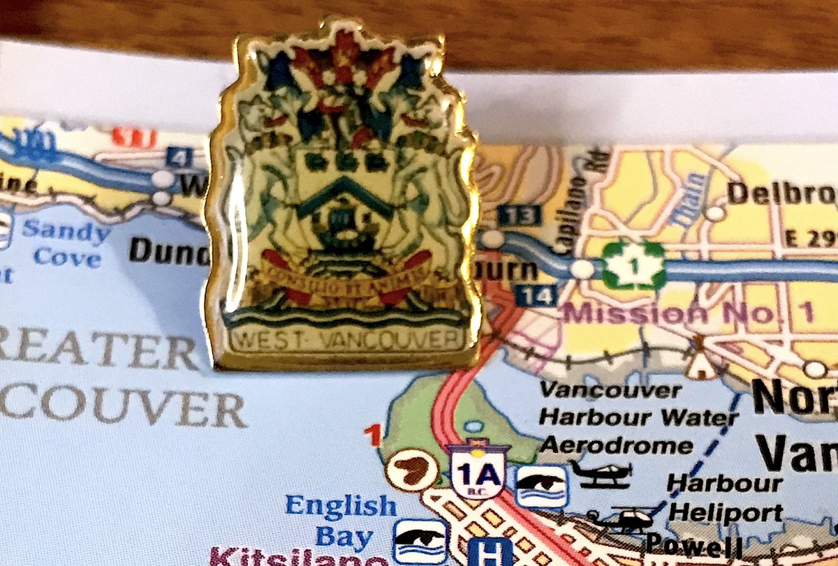 149. WEST VANCOUVER- cresssssssst pin - the boat in the middle is nice?- the weird laminated finish amuses me? - Latin motto means "By Wisdom and Courage", which is how all people who own land there think they got it