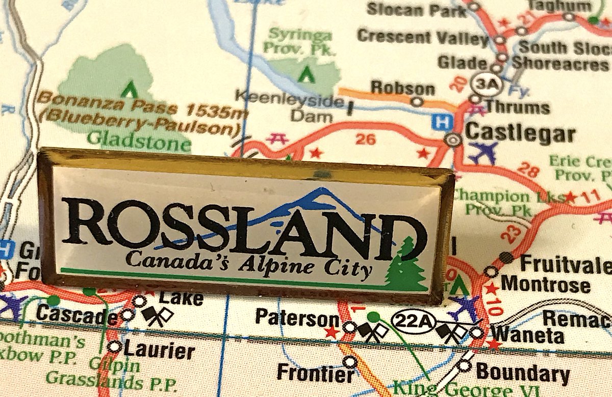 140. ROSSLAND- Rossland is a great quirky town and I'm annoyed they have a boring corporate pin- "Canada's Alpine City", debatable whether it's even B.C.'s- happy little tree in the corner is a nice touch