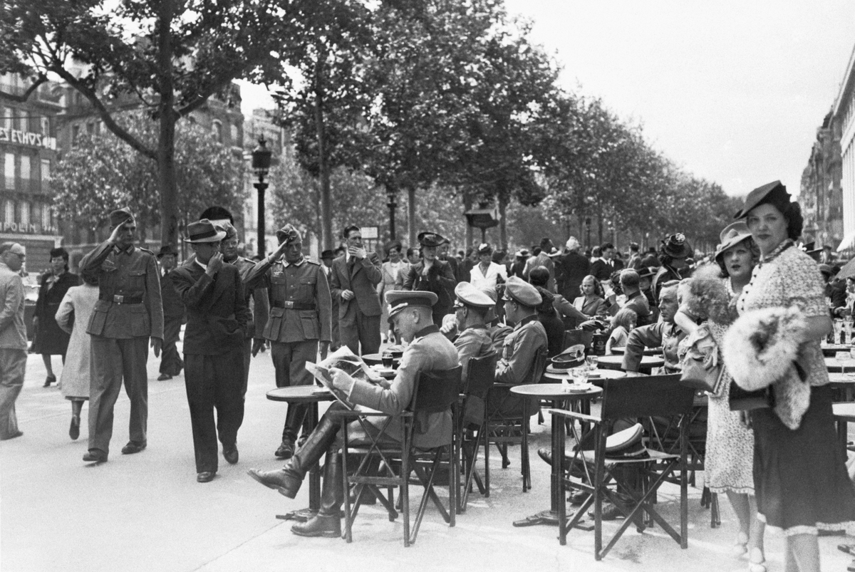 OpticNoir's tweet photo. Paris under Nazi Occupation    vs   African Occupation https://t.co/uAd8MR60m0
