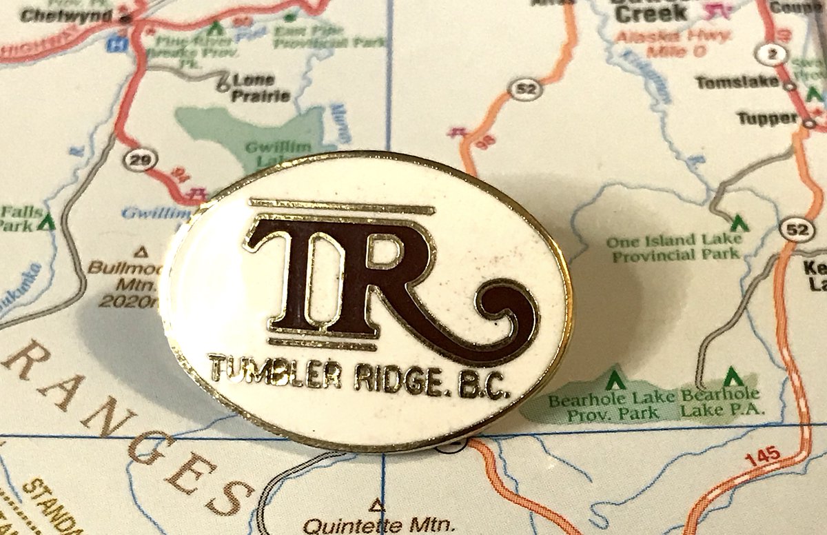 130. TUMBLER RIDGE- You have so many things that are interesting about your planned mining community! - And you went with "we'll just put the initials in a big fun font"- Decently striking though