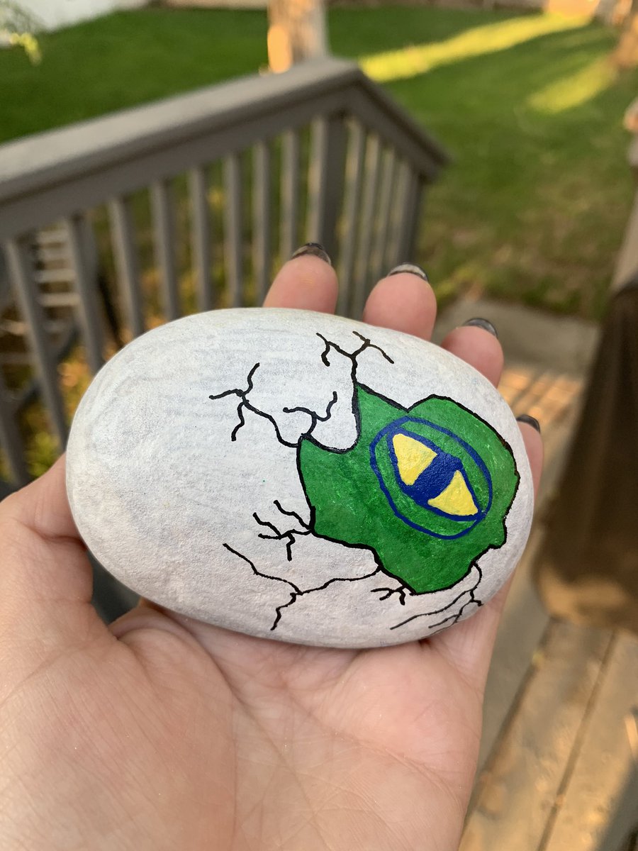 MeganMabey's tweet photo. Here’s another one of my painted rocks of a dinosaur hatching. 🦖 #RockPainting #SLCRocks https://t.co/M7Es8MymY6