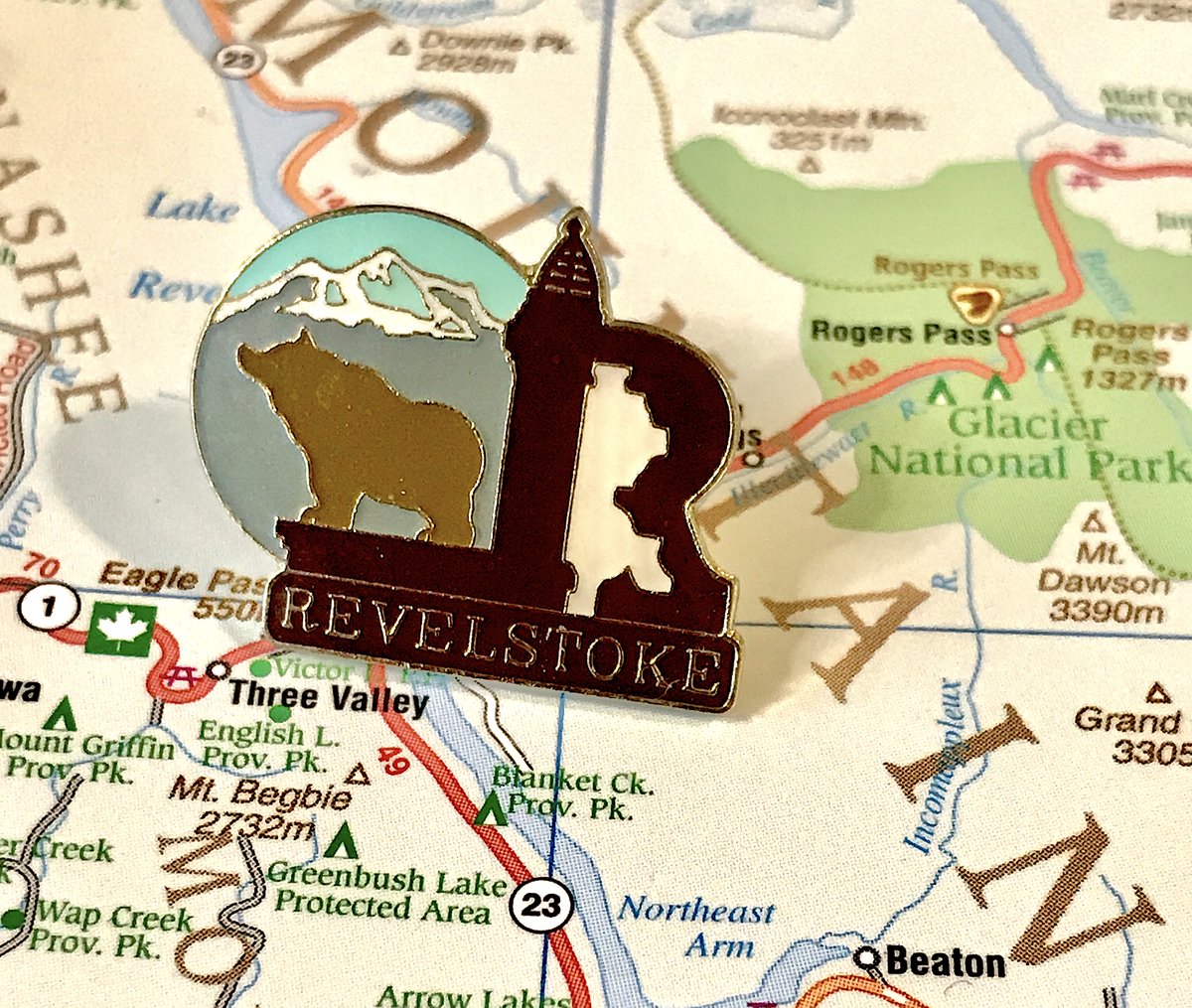 55. REVELSTOKE - Is the bear howling at an imaginary moon?- what is happening with that stylized r- Secondary pin is also fun, if weirdly robin hood themed for some reason