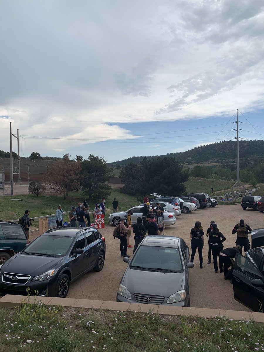 A lot of weapons and tactical gear today. I can spot at least 3 generations of ballistic vests here. About a platoon-sized(Army, not USMC) element of protesters right now...