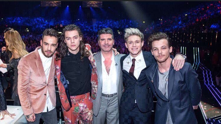 All of the boys are happier than they have ever been with Simon at their last performance, (nialls smile looks forced lol)