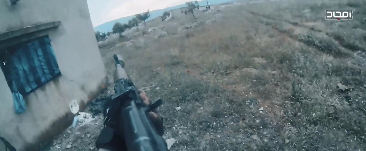 A number of dead SAA/NDF and a few captured are shown in Kafr Nabudah. The fighting for this town was bloody for both sides with severe losses in repeated counterattacks. The footage focuses again on the Red Bands' efforts and their gear, silencers prominent.