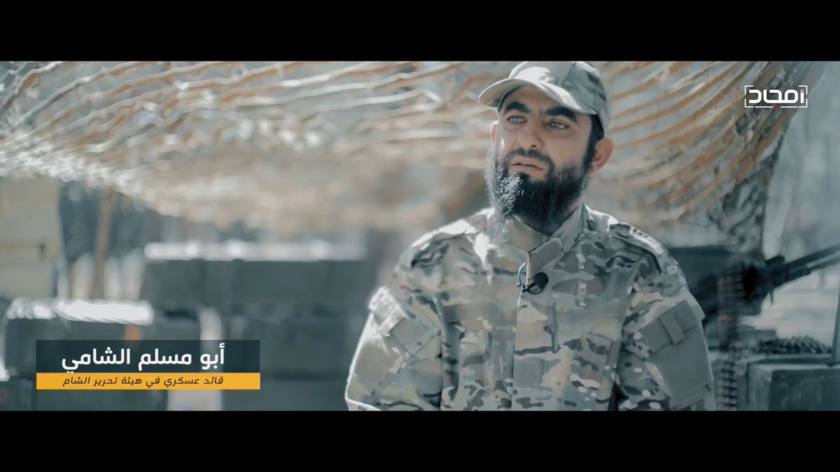 It's interesting that all of the other major speakers in the video so far, all HTS military commanders or field officers, are dressed up in fatigues and pictured with military backgrounds when Jolani opts for the "business casual/UPS floor manager" look.