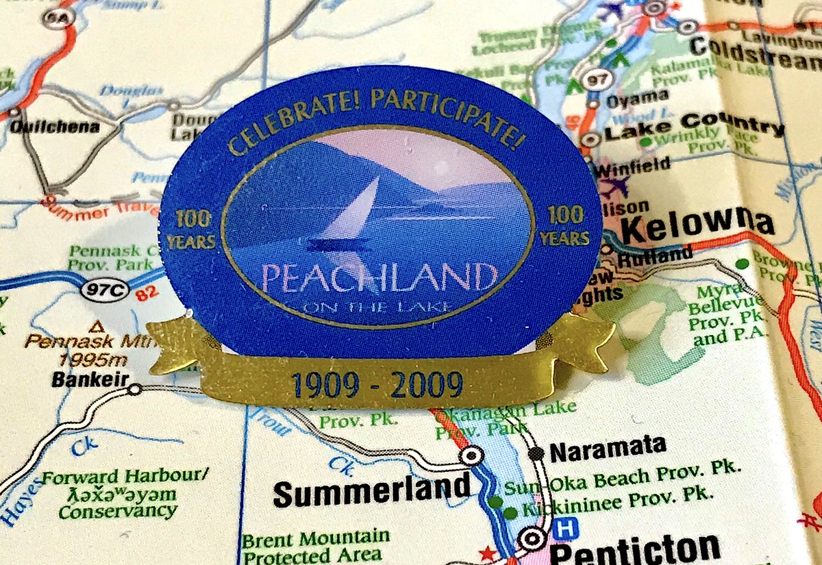 100. PEACHLAND- Celebrate! Participate! - How 'bout we just chill on beaches and enjoy some fruit- Love the faux 3D banner at the bottom- It's Peach "land", but it's "on the lake", you know what never mind