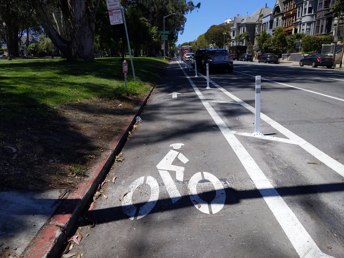 New parking protected bike lane on Fell, next to the GGP panhandle! It's 6'9" from curb to post, just right.