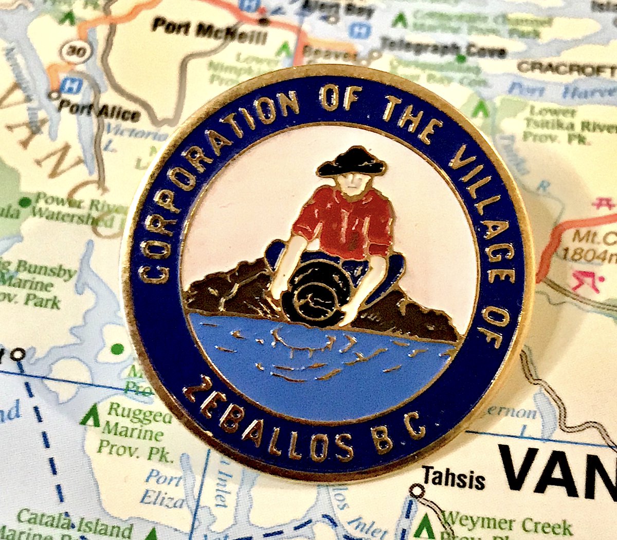 63. ZEBALLOS- gold pan man loves his corporation of the village- the balance on this pin is pretty good- yes, I have a Barkerville pin, but it's not a municipality so I'm not showing it as part of this