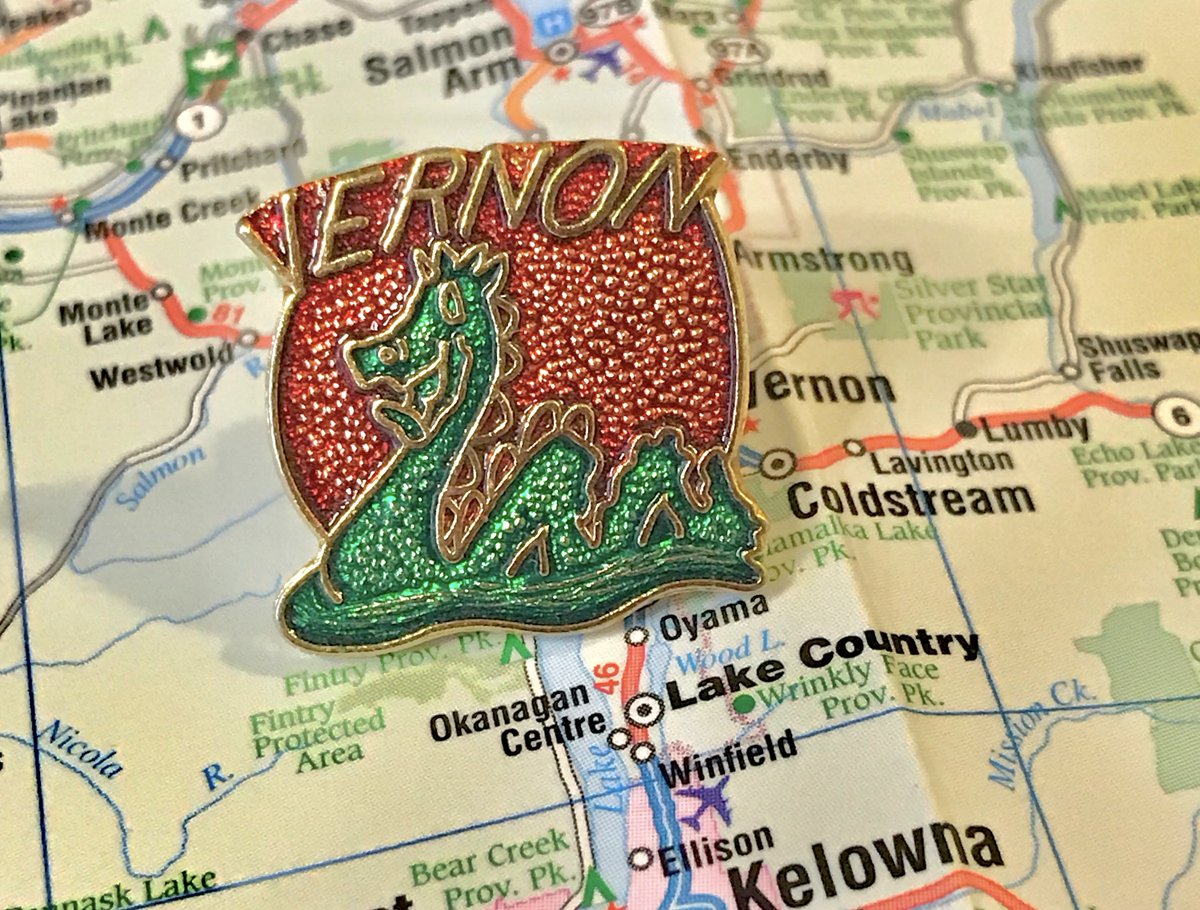 29. VERNON- love me some ogopogo- the background has a fun physical feel to it, and also adds some fun variety to the pin- vernon also an apple pin, and unlike keremeos can spell its name correctly