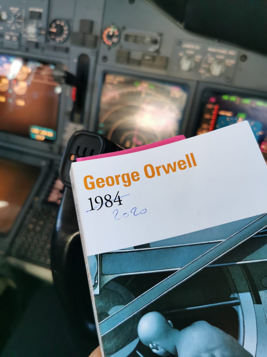 claudiasavuoger's tweet photo. #pilot husband read #onflight; #COVID19 #covid1984 #georgeOrwell #1984 #COVID #airliners #flyagain #cockpit https://t.co/xgu0St5Au1