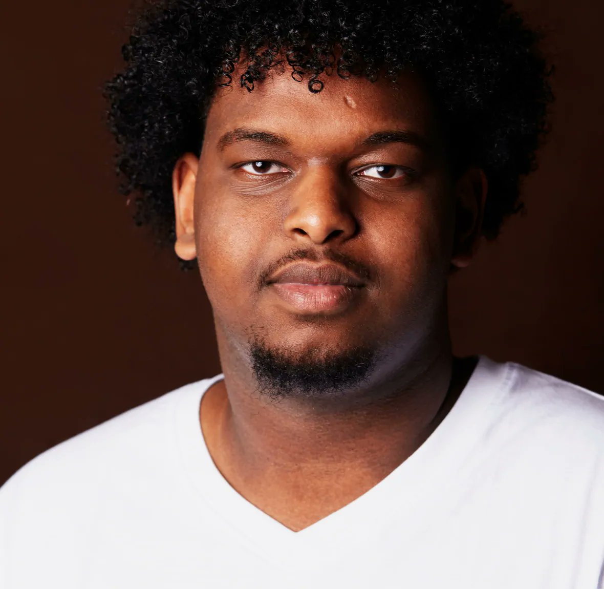 CBCOttawa's tweet photo. A new photo series "Portraits of Black Somali Youth from Ritchie" pairs a dozen images of young men from that #Ottawa community with their first-person stories of racial discrimination: https://t.co/7vKxENLlYB https://t.co/wah7PLK174