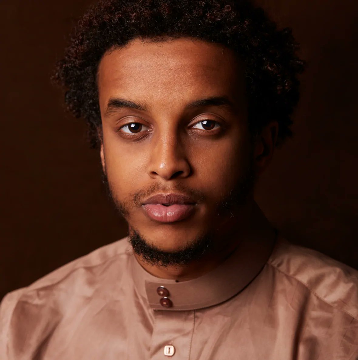 CBCOttawa's tweet photo. A new photo series "Portraits of Black Somali Youth from Ritchie" pairs a dozen images of young men from that #Ottawa community with their first-person stories of racial discrimination: https://t.co/7vKxENLlYB https://t.co/wah7PLK174
