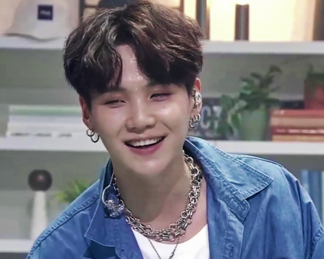 Yoongi staring into your soul. I dare you to stare right back at him if you can