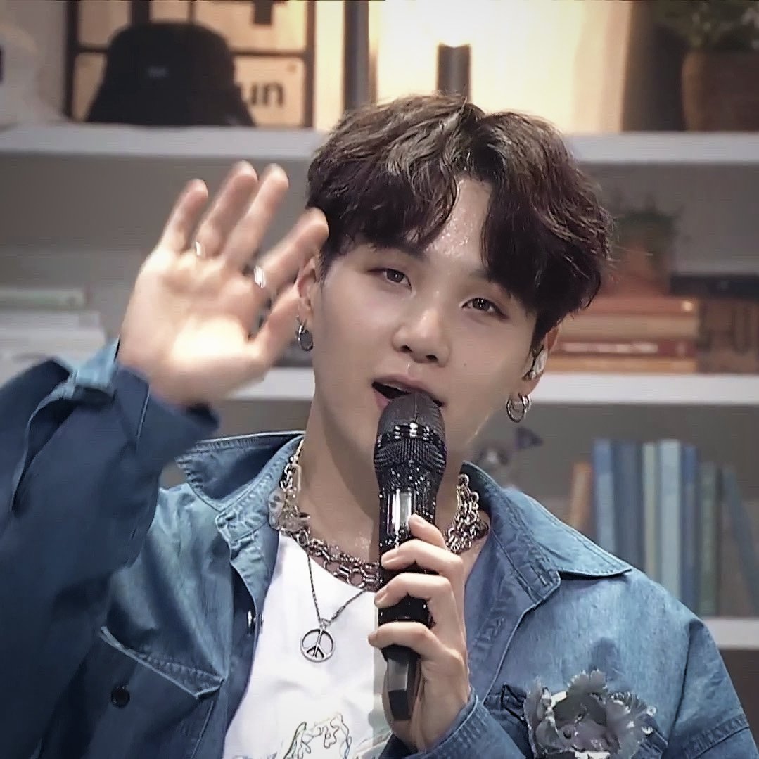 Yoongi staring into your soul. I dare you to stare right back at him if you can