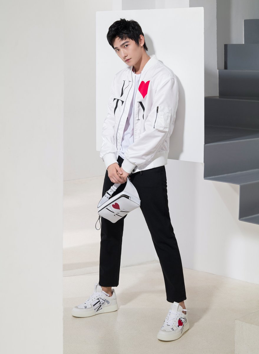 MaisonValentino's tweet photo. Love, every step of the way. A romantic narrative takes hold for Chinese Valentine’s Day, featuring actor #YangYang. Discover the #VLoveTN capsule collection, featuring a newly reimagined graphic based on the iconic VLTN logo, at https://t.co/7XxwRqpida https://t.co/g5scQUcBxY