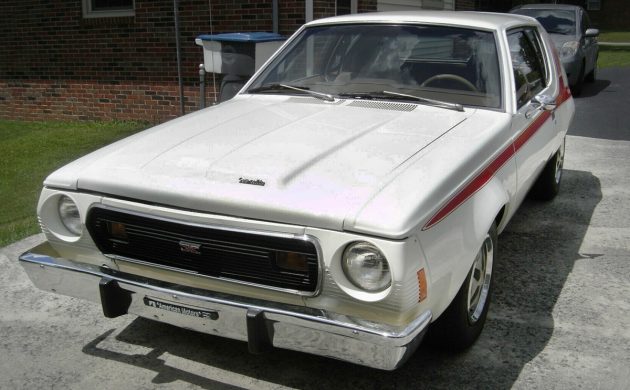 barnfinds's tweet photo. This 1974 AMC Gremlin X has been restored and it has a 4.0L Jeep six-cylinder engine. Thoughts? -> https://t.co/4mBjKKJduF #AMC #GremlinX https://t.co/nGrLa9KiVd