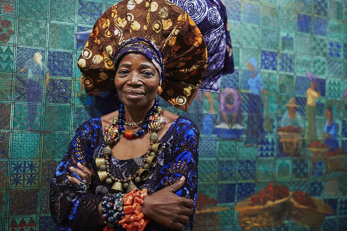 NIKE DAVIES-OKUNDAYEShe is the internationally acclaimed owner of the Nike Art Gallery. She is famous for her batik weaving and her intricately designed art. Her artworks are often elaborate with radiant and striking colors. A true enigma!