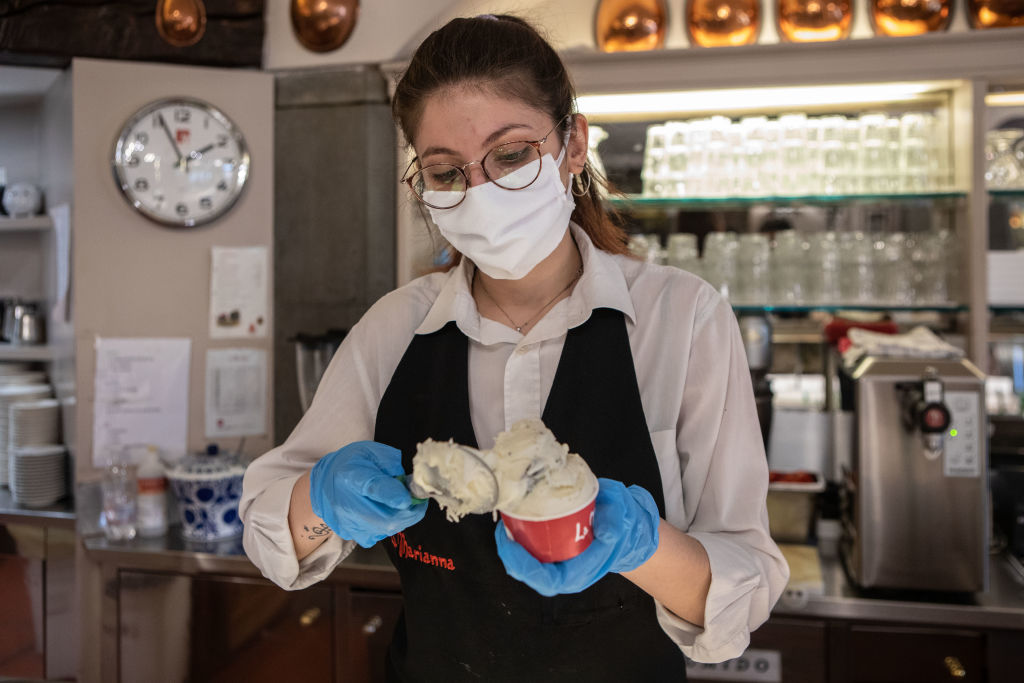 Italians have to:Have their temperature checked before taking a trainGive restaurants full contact details for infection tracingFill out special forms for access to tourist hotspotsThose who break quarantine face fines or jail time  http://trib.al/5co5dSU 