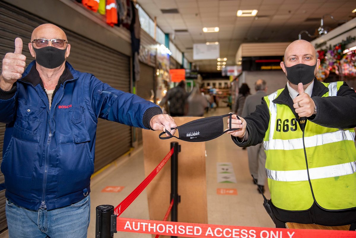 WolvesCouncil's tweet photo. Doing their bit to help prevent the spread of coronavirus, Wolverhampton resident Ron Gibbons & Steve Hickmann from Bilston market wear their face coverings in Bilston’s Indoor Market.
https://t.co/AWLHrp3Urt #ProjectRelight #StaySafeBeKind w/ @WV_MarketPlace https://t.co/M37MdSn8Xj