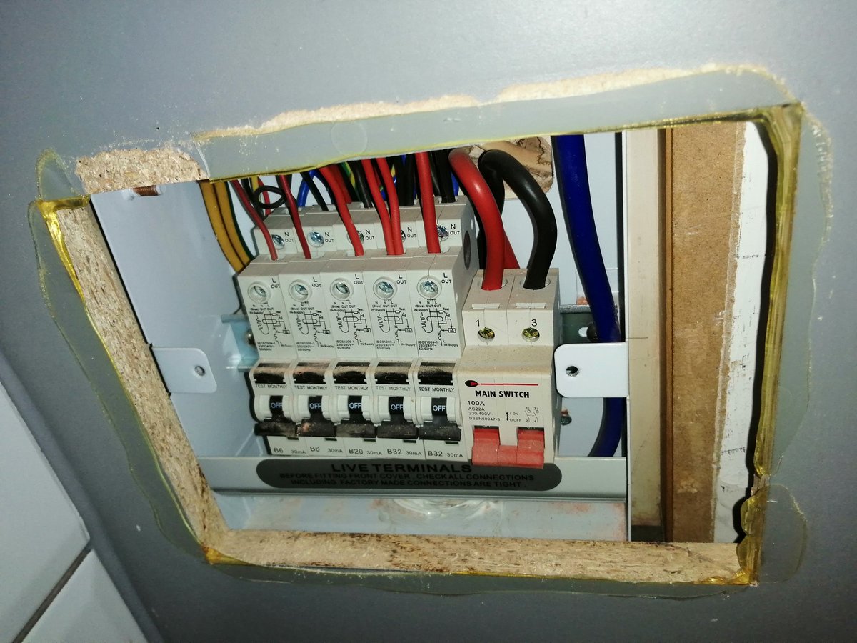 SulisElectrical's tweet photo. On an Eicr in #bath kitchen fitter decided to box the consumer unit in. Can't reach neutral or earth bars... Why do this? If there is a problem kitchen gets ripped to pieces. #lookscanbedeceiving #electrician #electrical #niceic #elecsa #sparky #sparkylife https://t.co/K6bGNl7MLO