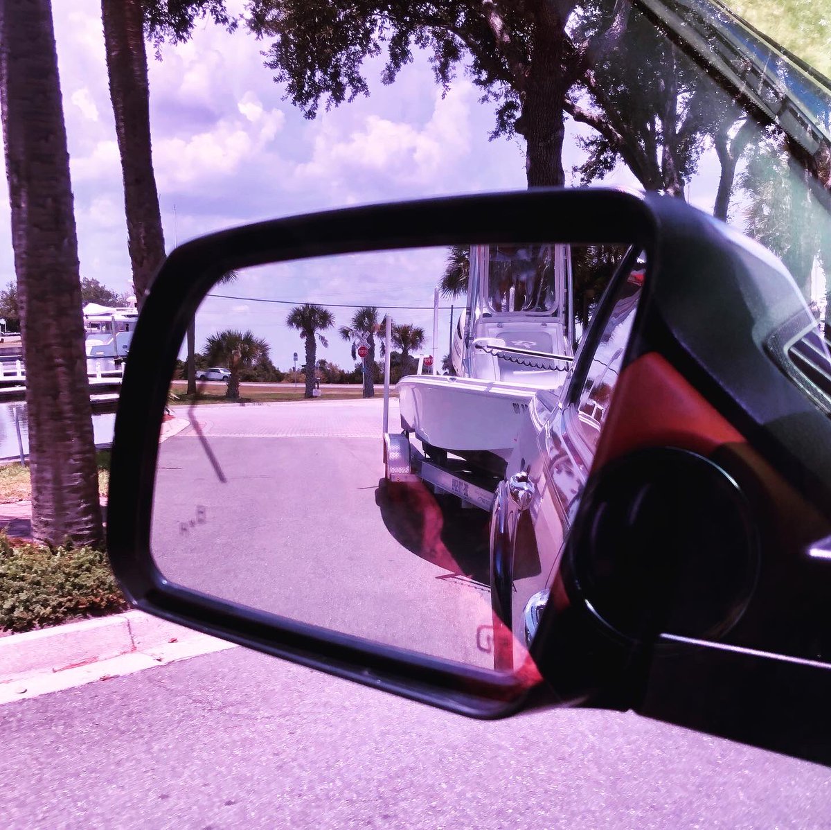 NoLimitsCharter's tweet photo. Rear view mirrors full of Glasstream while retrieving Reel Pirate II from GA where it was tucked away from Isaias! Thinking of everyone not so fortunate with Isaias. #glasstream @MinnKotaMotors @glasstreamboats #hurricaneisaias #namedstorms #boatlife 🌊🏴‍☠️💨 https://t.co/pzpusOHyK7