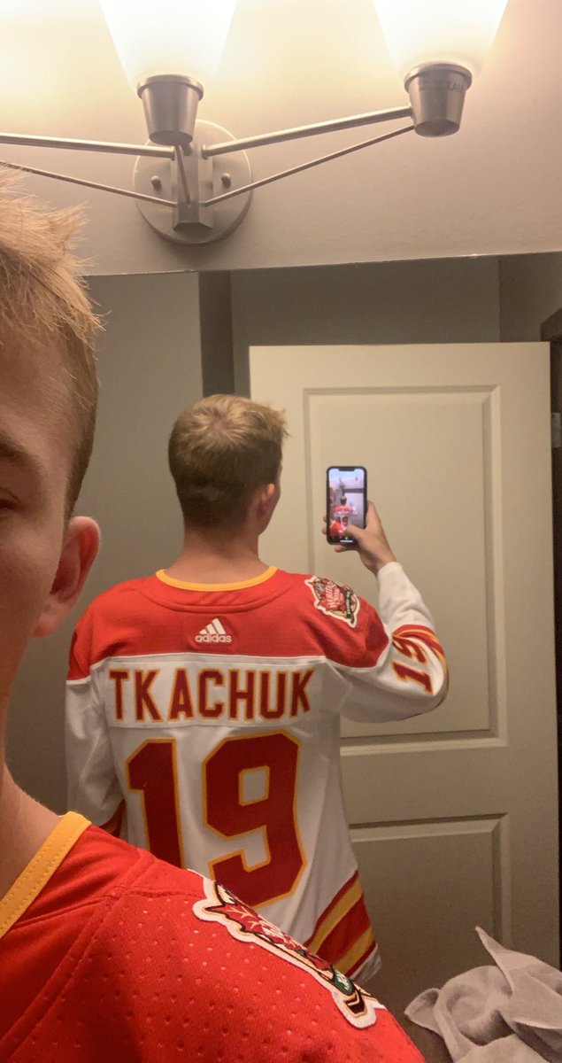 KStelski's tweet photo. Girlfriend bought me this ABSOLUTE beauty of a jersey with an even bigger beauty on the back for my birthday😍😍😍 #Flames @NHLFlames https://t.co/kemGl5aldV
