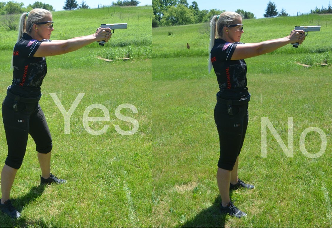  https://www.police1.com/police-products/firearms/training/articles/the-3-shooting-stances-which-ones-right-for-you-LA3iowVFZFC9hE24/3 popular stances and pros/cons to each. When it comes to ANY firearm, for the love of all things, DON'T LEAN BACK. You want to lean into the firearm. It makes you much more sturdy and less likely to flail about when you fire.