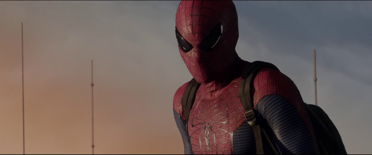 I mean, do I even have to say anything? This is gorgeous to me! His colors, his textures and webs done in serigraphy, and for the first time on the big screen, the webs are actually black, and they look badass! I love how lean he looks, I love the sports shoes and lots more.
