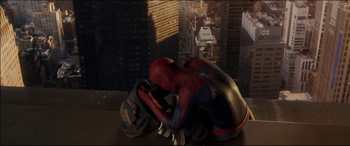 The way the light hits this suit it's magnificent to me.Also, I remember how in this moment I had a super big smile in theater, it's exacly the kind of scenes I loved from the comics, it reminded me the many panels of Spider-Man speaking to someone thru a pubblic telephone.