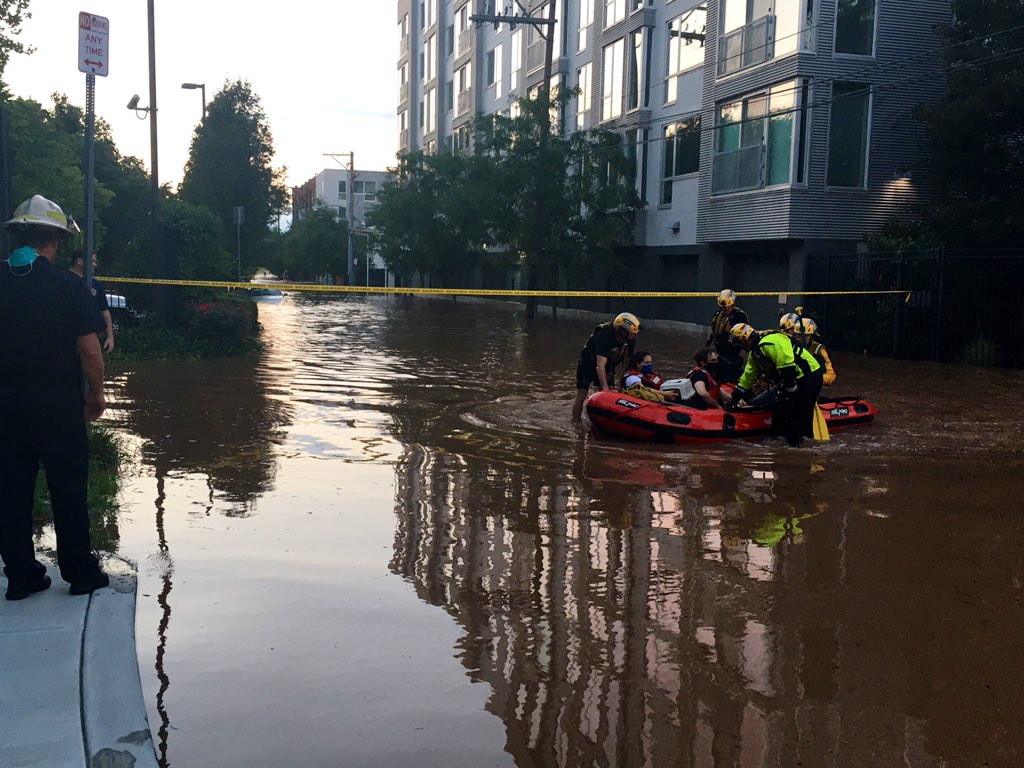 ThielAdam's tweet photo. .@PhillyFireDept + @PhilaOEM members evacuating residents from #Isaias flooding in Manayunk this evening... https://t.co/zlq43AdW0C