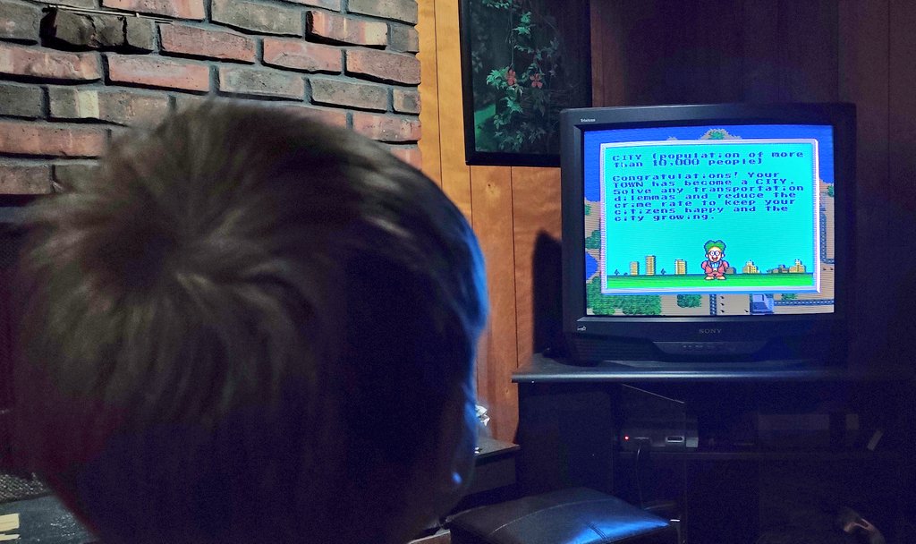 samsonasu's tweet photo. Kid crushing it at SNES sim city. Name of the city is "FARTVIL" obviously https://t.co/gS5ZgI6QI6
