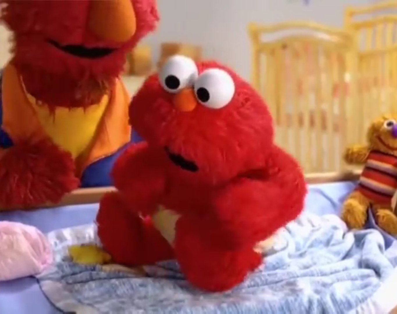Elmo bebe peluche sale