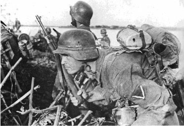 It could also be used to attach a rolled greatcoat/blanket across the top, yet that is rarely seen in pics that are presumably nearer combat.If you are trying to ID infantry from motorised/Panzergrenadiere, the latter would not typically be issued this equipment item. 13a)