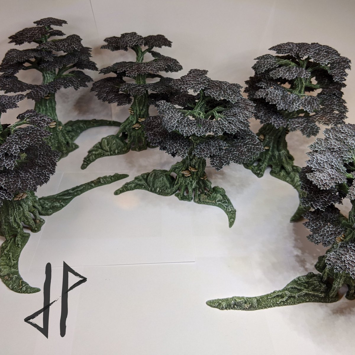 JPMiniatures's tweet photo. So I have managed to make some more scenery for #warcry .The idea behind the trees is that they are a part of the #ebonforest found stretching between #Ulgu and #Ghyran (through a moondoor realmgate) where the forest floor is in perpetual shadow from the black leaved trees above. https://t.co/oUoUC9FVs9